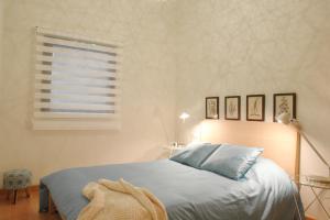 A bed or beds in a room at Moderno y Centrico Apartamento 1 dormitorio