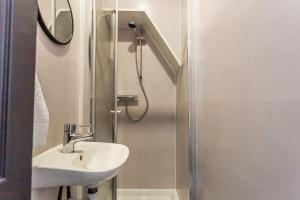 a bathroom with a sink and a shower at Room 07 - Sandhaven Rooms Double in South Shields