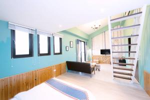 TV a/nebo společenská místnost v ubytování Snail B&B