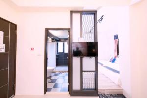 TV a/nebo společenská místnost v ubytování Snail B&B