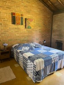 Postel nebo postele na pokoji v ubytování Chalés Sítio Do Tanque