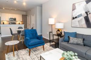 a living room with a couch and chairs and a table at Landing - Modern Apartment with Amazing Amenities (ID4378) in Auburn Hills