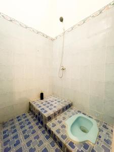 Um banheiro em Villa Pakem
