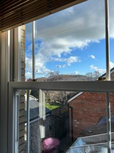 a window with a view of the sky at Glengarth house Room only accommodation in Wells