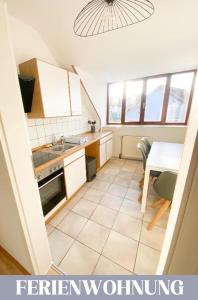 Kuchyň nebo kuchyňský kout v ubytování Hotel Lamm