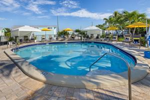 a large swimming pool with a slide in a resort at Sun Outdoors Marathon in Marathon