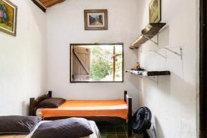 Giường trong phòng chung tại Piscina Vista Natureza Paz