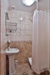 Vannituba majutusasutuses Guest house Mali hotel
