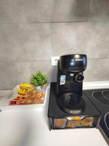 A kitchen or kitchenette at Ático 32