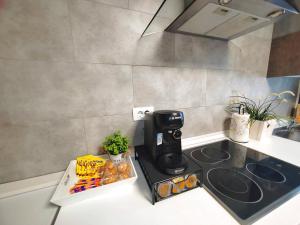 A kitchen or kitchenette at Ático 32