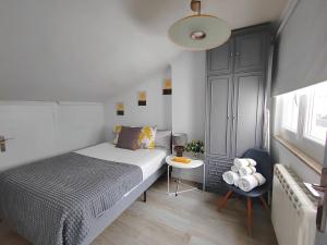 A bed or beds in a room at Ático 32