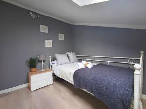 A bed or beds in a room at Ático 32