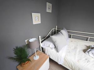 A bed or beds in a room at Ático 32
