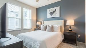 Ένα ή περισσότερα κρεβάτια σε δωμάτιο στο Landing - Modern Apartment with Amazing Amenities (ID8375X72)