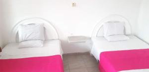 Cama o camas de una habitación en Hotel San Miguel