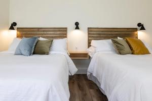 Krevet ili kreveti u jedinici u okviru objekta Hilltop 104 Inn at Old Beach