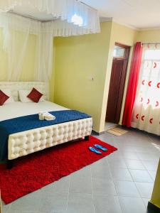 Postel nebo postele na pokoji v ubytování Yonga Apartment + 7 fotografií