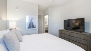 Cama o camas de una habitación en Landing - Modern Apartment with Amazing Amenities (ID8935X42)