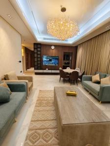 Posezení v ubytování Elaf Suites Al Hamra