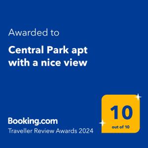 un cartel amarillo que dice aplicación Central Park con una bonita vista en Central Park apt with a nice view, en Baku