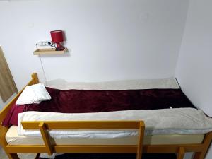 Cama ou camas em um quarto em Java apartments - S & J