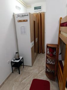 Cama ou camas em um quarto em Java apartments - S & J