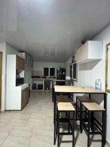 Kuchyň nebo kuchyňský kout v ubytování JAZMIN HOsTEL + 20 fotografií