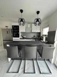Kuchyň nebo kuchyňský kout v ubytování Apartman Garden Vodice