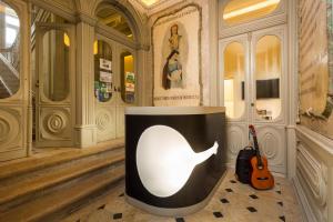 TV a/nebo společenská místnost v ubytování Serenata Hotel & Hostel Coimbra