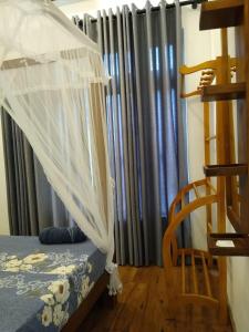 Postel nebo postele na pokoji v ubytování Welcome Inn Mirissa