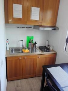 A kitchen or kitchenette at Appartamento trilocale la villetta