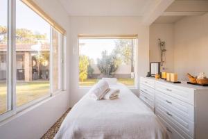 Ένα ή περισσότερα κρεβάτια σε δωμάτιο στο Exclusiva Residencia de Lujo con Alberca Privada +31 φωτογραφίες
