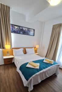 Postel nebo postele na pokoji v ubytování Jafar Resort 6