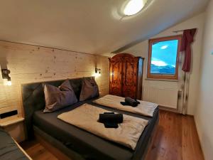 Postel nebo postele na pokoji v ubytování Chalet Leo