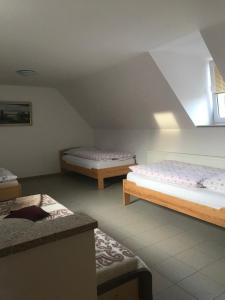 Postel nebo postele na pokoji v ubytování Apartmán Dolánek + 31 fotografií