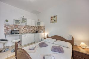 Kuchyňa alebo kuchynka v ubytovaní Studio Apartmani Ivanda