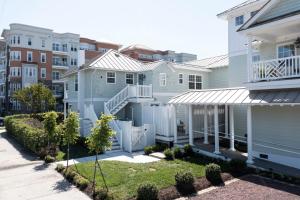 a row of houses in a city at Breakers 204 Inn at Old Beach in Virginia Beach
