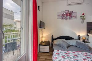 Posteľ alebo postele v izbe v ubytovaní Studio Apartmani Ivanda