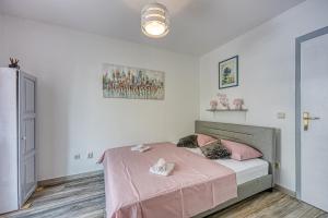 Posteľ alebo postele v izbe v ubytovaní Studio Apartmani Ivanda