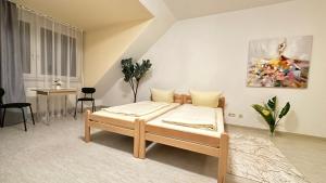 Postel nebo postele na pokoji v ubytování Moderne Appartement