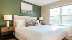 Cama o camas de una habitación en Landing - Modern Apartment with Amazing Amenities (ID7050X25)