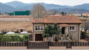 Fotografia z galérie ubytovania Ca la Joia Casa con piscina privada en la Vall d'en Bas v destinácii Les Preses