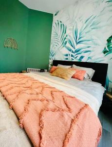 Säng eller sängar i ett rum på Appartement tropical