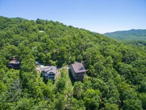an aerial view of a house in the middle of a hill at Almost Bearadise Brand New 5 Bedroom Home with Views in Black Mountain