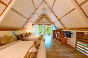 Voodi või voodid majutusasutuse Shawandha Lodge toas