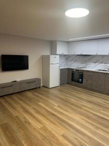 Kuchyň nebo kuchyňský kout v ubytování ESTEL Home