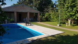 Bazén v ubytování Cabañas EL PATO Coronda Santa fe nebo v jeho okolí + 22 fotografií