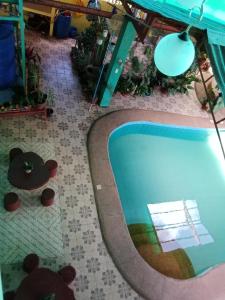an overhead view of a swimming pool in a house at Villa Ceferina in Tagbilaran City