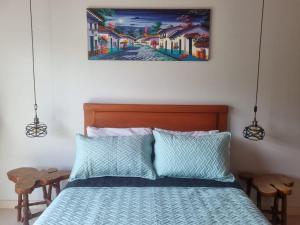Voodi või voodid majutusasutuse Hotel la casona de Wiky toas