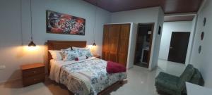 Voodi või voodid majutusasutuse Hotel la casona de Wiky toas